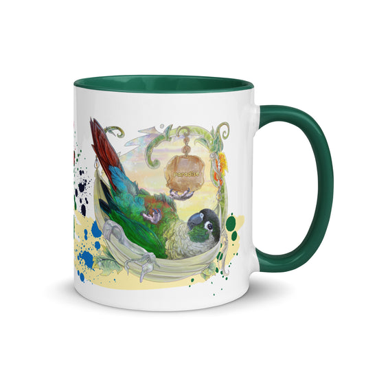 Green cheeked conure ceramic Mug for bird and parrot lovers by Canadian Bird Artist Cinksart Mug blue and white color with glossy finish 11 oz cute bird in paradise - Right Side view - Mug vert et blanc en céramique, Tasse verte et blanche avec conure à joues vertes couché dans un hamac au paradis illustration par l'artiste québécoise Cinksart, illustratrice d'oiseaux depuis 2024 ( tasse vue coté droit )